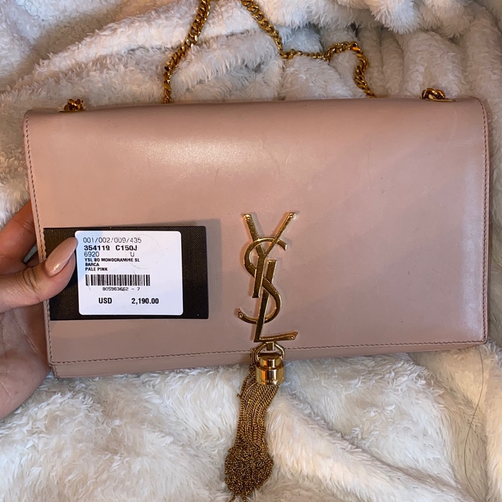 Ysl clutch with tassel